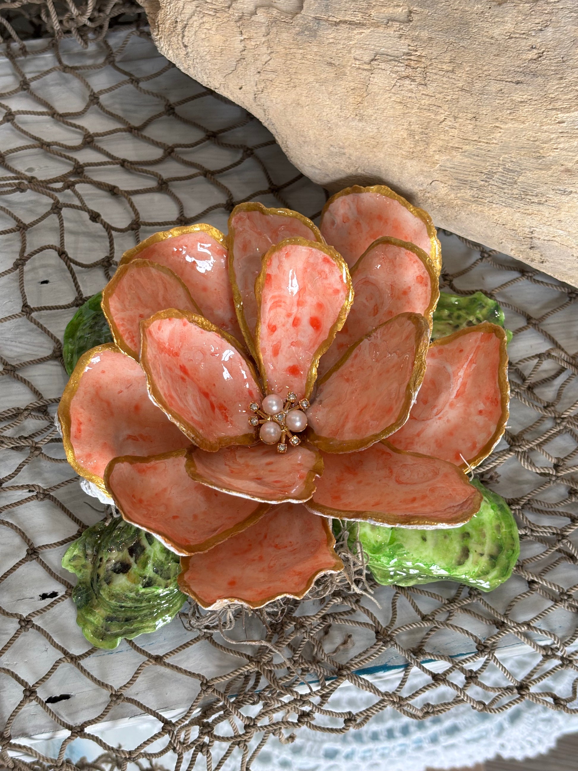 Handcrafted mussel shell magnolia flower with pearl accent, coastal decor